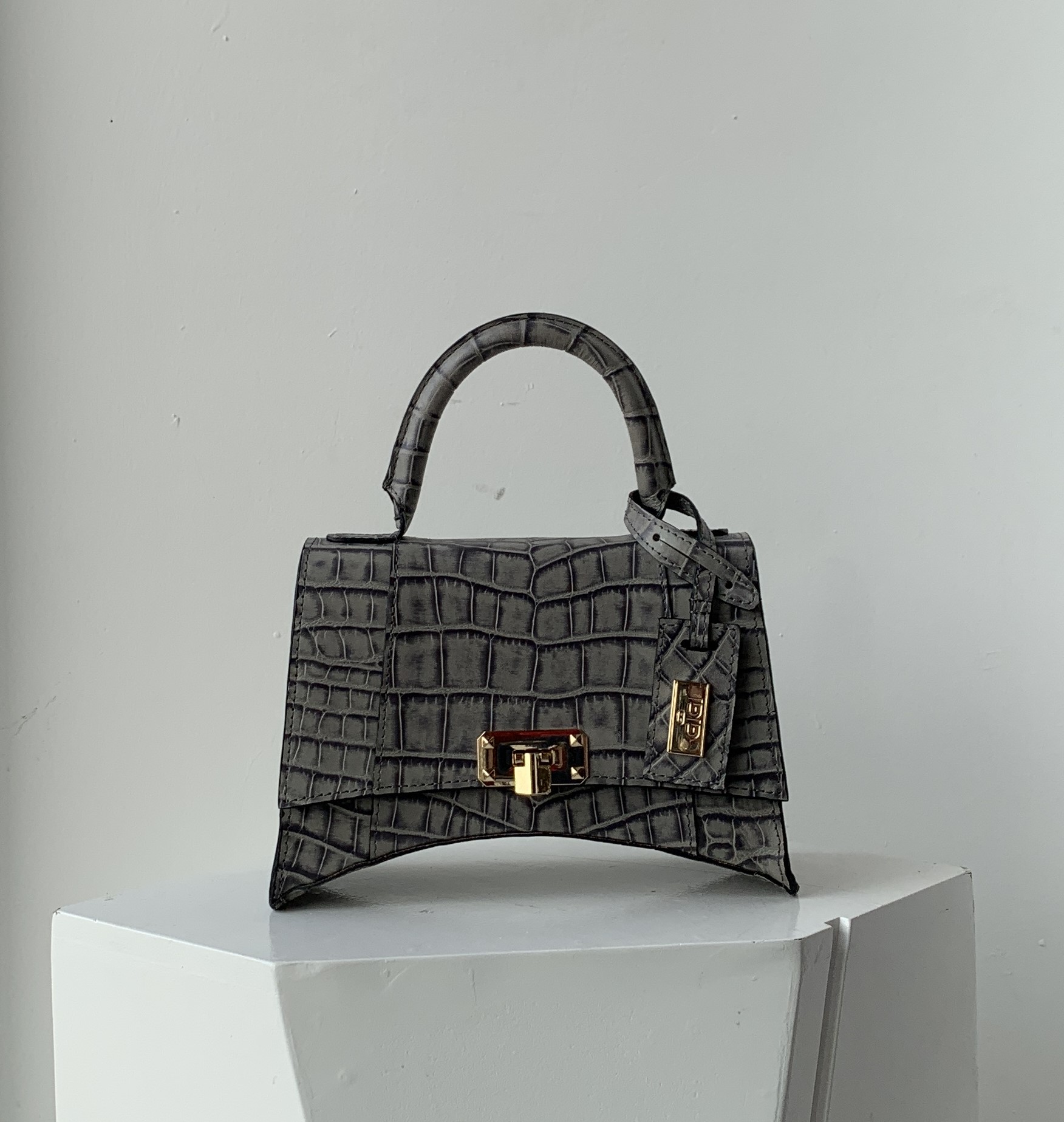 structured top handle handbag front